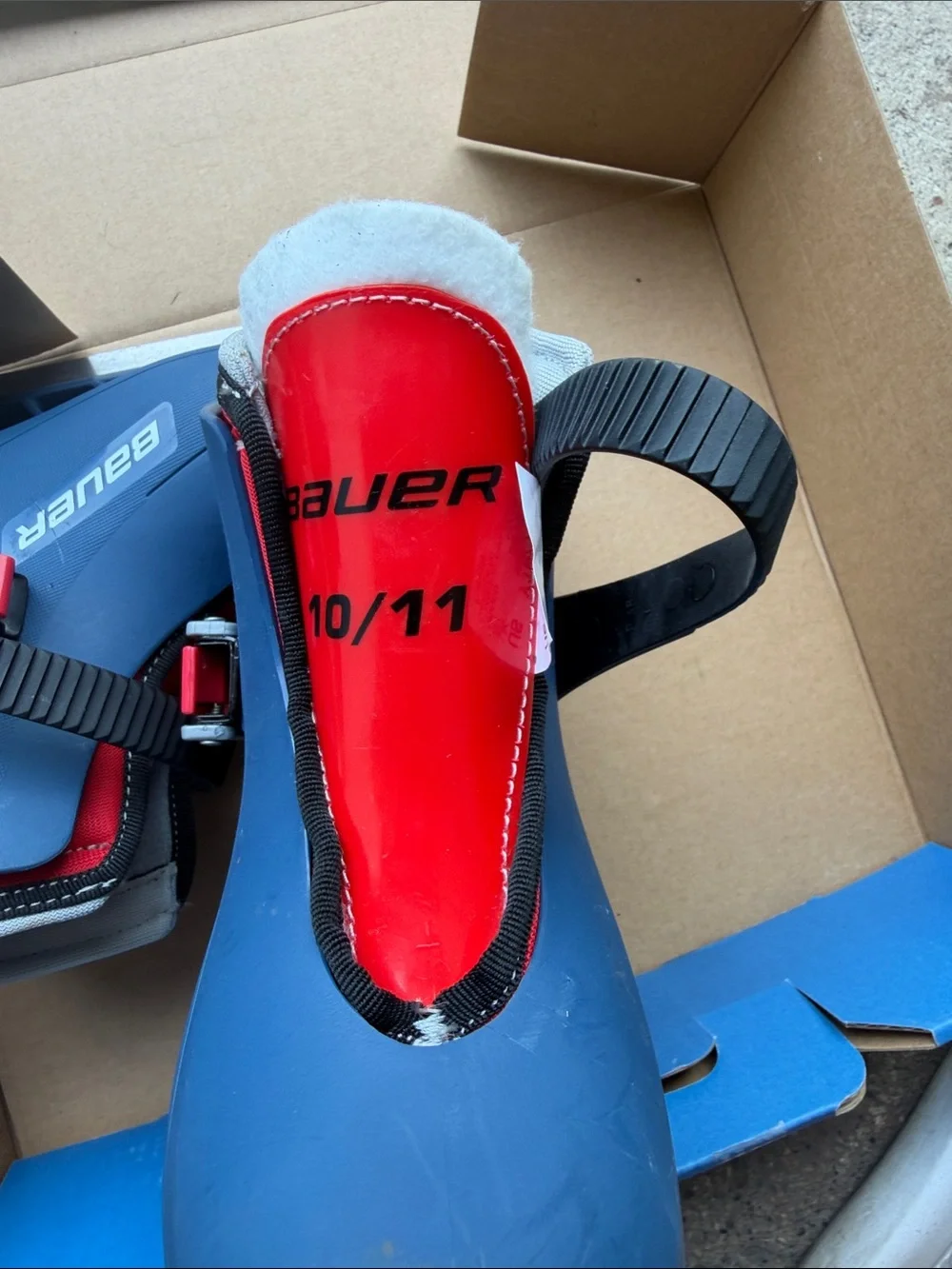 Bauer Kids Blue and Red Adjustable Ice Skates